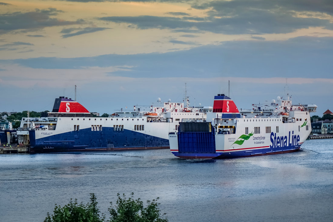 Stena Line ferry in River Venta with old town and castle of Ventspils behind it