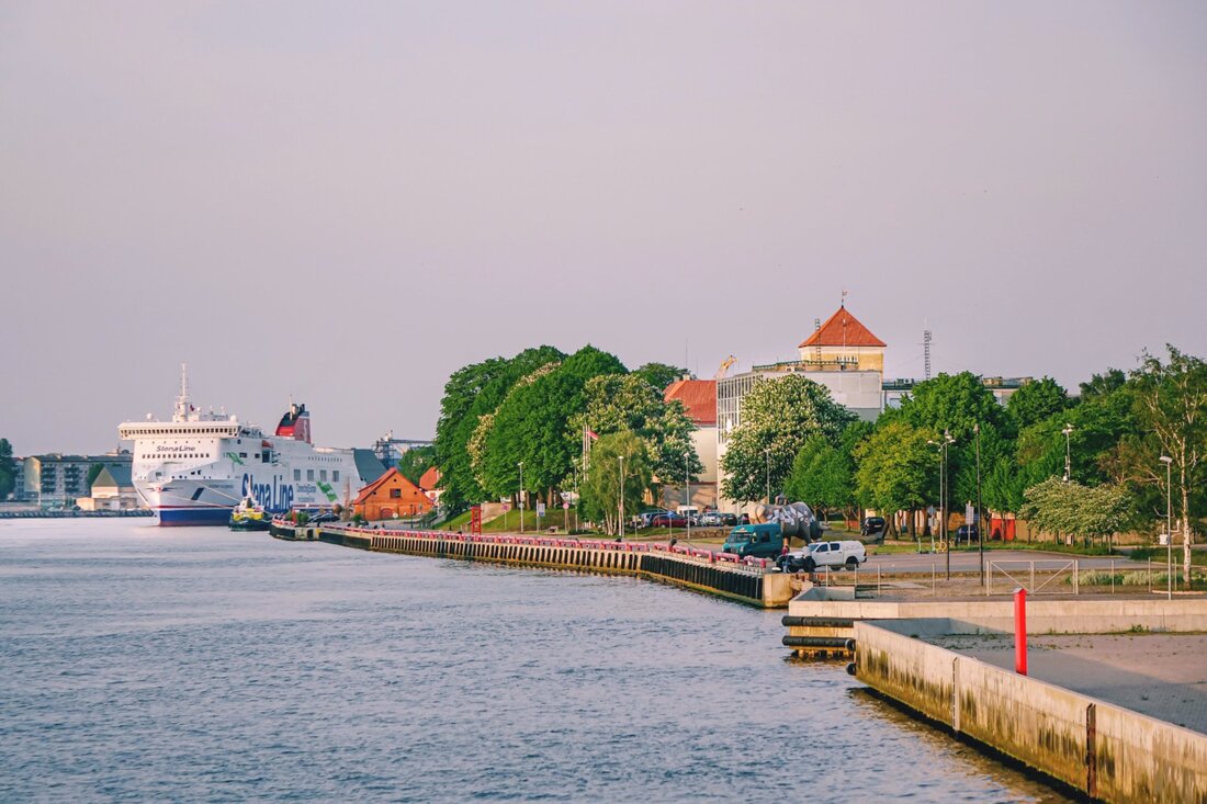Panorama of Ventspils from River Venta with old town, castle and Stena Line ferry